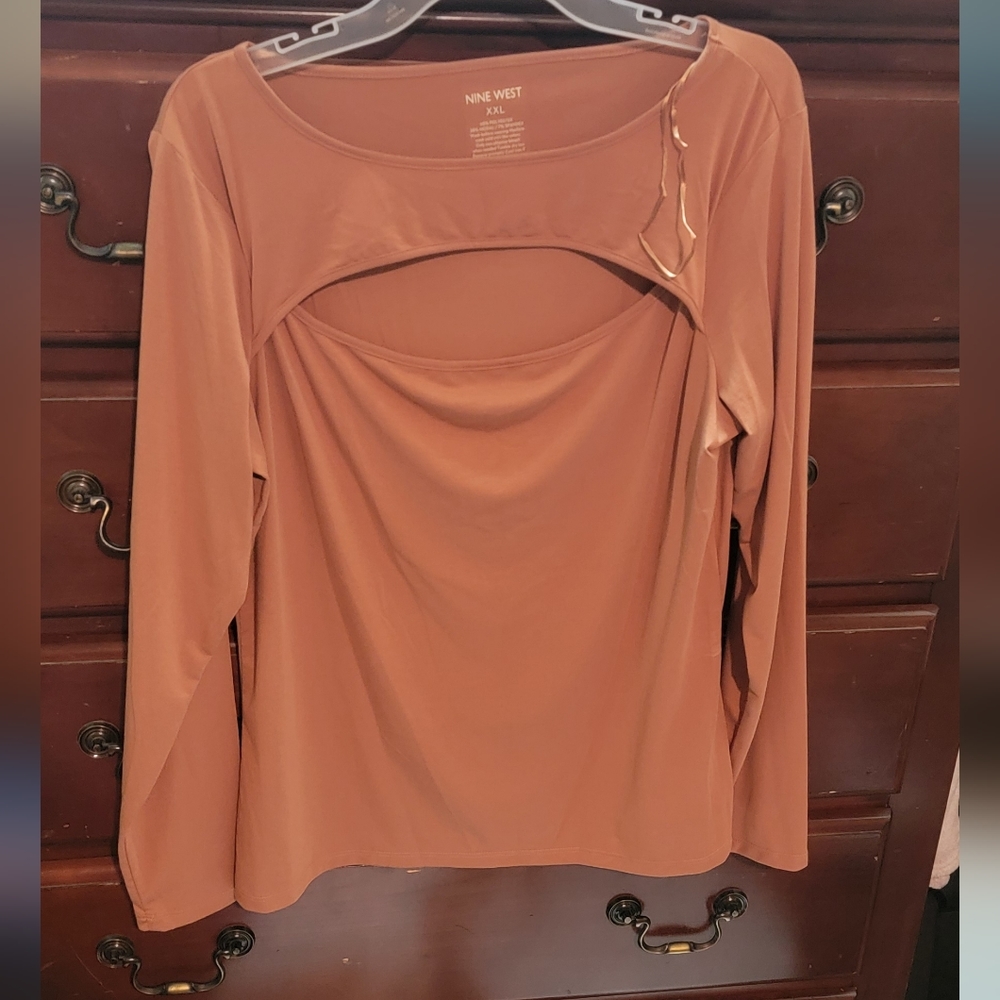 2/$5 Pink Peek-a-boo Top